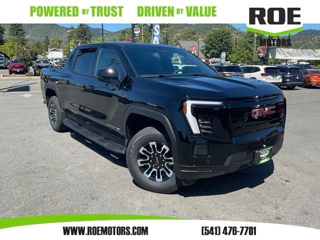 2026 GMC Sierra EV Elevation Standard Range in Onyx Black — front three-quarter view