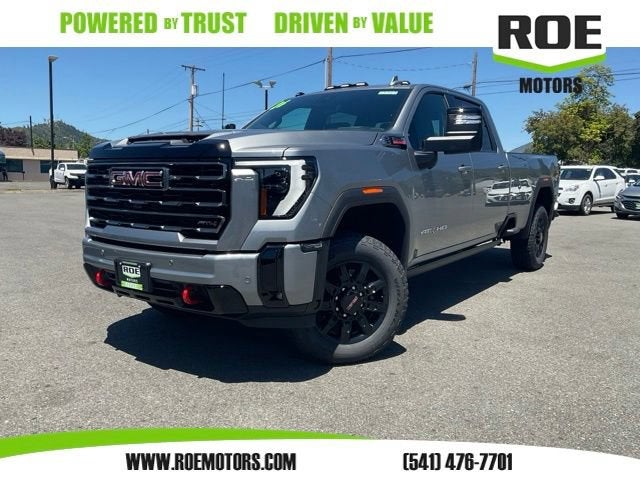 2026 GMC Sierra 3500 HD AT4 in Sterling Metallic — front three-quarter view
