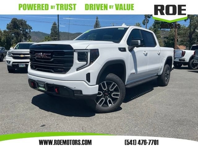 2026 GMC Sierra 1500 AT4 in Summit White — front three-quarter view