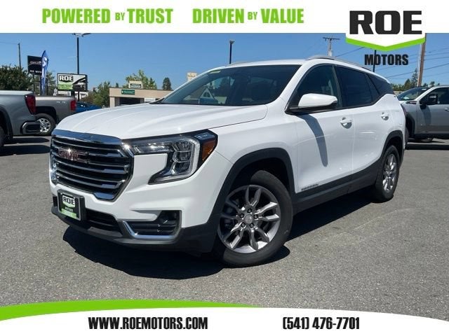 2024 GMC Terrain SLT in Summit White — front three-quarter view