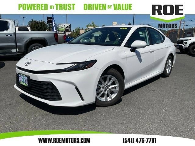 2025 Toyota Camry LE in White — front three-quarter view